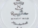 a close up of a plate with a crown on it