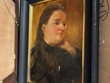a painting of a woman in a black dress sitting in a box
