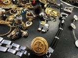 a table with a bunch of jewelry on it