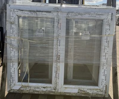 a large window that is sitting in the back of a truck