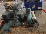 many tools on a table in a warehouse