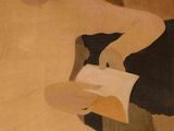 a painting of a woman holding a piece of paper
