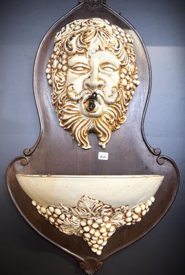 a picture of a wall clock with a face on it