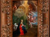 a painting of the virgin and angels in a wood frame