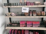 a lot of lipstick on the shelves in the store