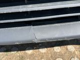 a close up of the front bumper of a car