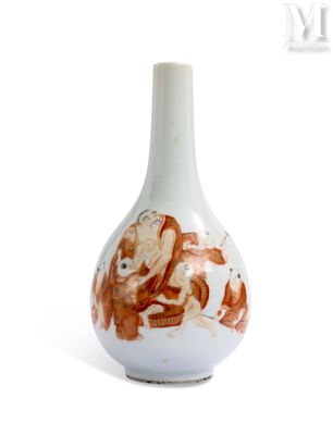 a white vase with a picture of a man and a woman on it