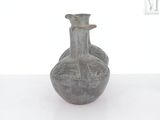 a small vase that is sitting on a table