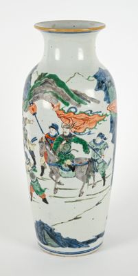 a vase with a painting on it on a white surface