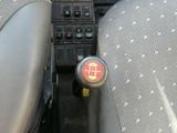 an image of a car dashboard with buttons and a control panel