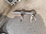 a wren and a wrench on the ground next to a bike