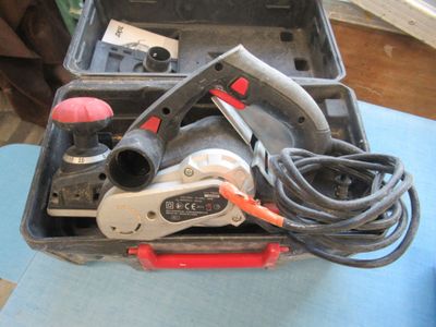 a box with tools in it sitting on a table