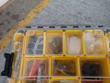 a yellow box with many different items in it