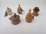 a lot of small wooden objects that are on a table