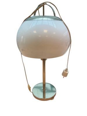 an image of a table lamp with a glass shade on it