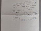 une vieille lettre écrite à l'encre bleue sur une feuille de papier blanc