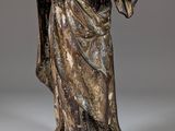 an image of a statue of jesus holding a child