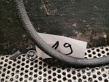a piece of paper that has been placed on top of a metal grate