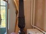 a lamp that is sitting on a table in a room