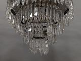 a large crystal chandelier hanging from a ceiling
