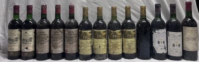 several bottles of wine are lined up in a row on a table