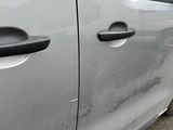 a car that is parked on the side of the street