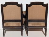 pair of antique chairs with upholstered back and arms