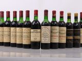 six bottles of wine lined up in a row on a table