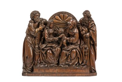 an image of a wooden sculpture of a group of people