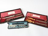 three different types of knives in a case