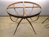 a glass table with a wooden frame on top of it