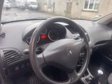 dashboard of a car with a steering wheel and dashboard gauges