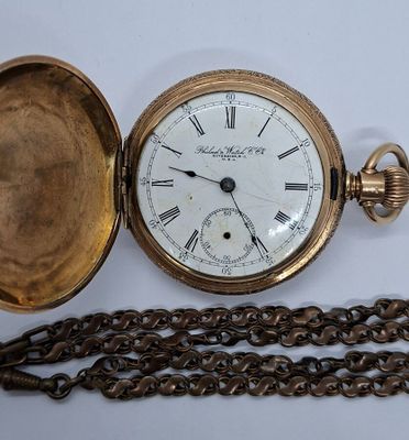 MONTRE de poche savonnette en métal doré, le capot gravé d'u…