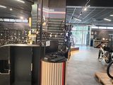 a bike shop with a lot of bikes on display