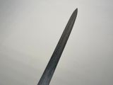 an image of a knife that is in the air