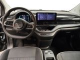 the interior of a car with a steering wheel, dashboard, and dashboard controls