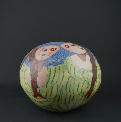 an image of a decorative vase with owls painted on it
