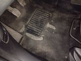 an image of a dirty floor in a car