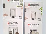two boxes of brabantia coffee maker sitting on a table