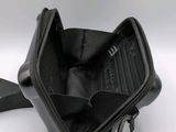 a small black purse with a zipper on it