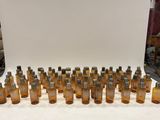 an image of a group of bottles of perfume sitting on a table