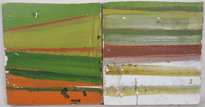 two pieces of wood with different colors of paint on them