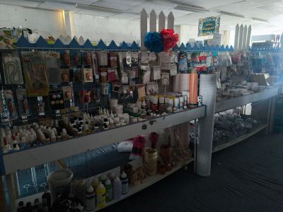 many different items on the shelves in the store