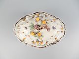 a small bowl with a horse on it