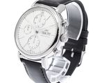 a close up of a watch on a white background
