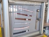 a display case with a bunch of knives inside of it