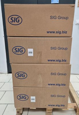 three boxes stacked on top of each other on a pallet