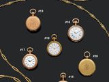 an assortment of gold and silver pocket watches on a black background