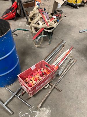 a lot of tools that are sitting on the ground