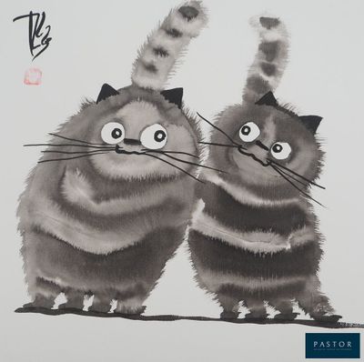 two cats that are standing next to each other
